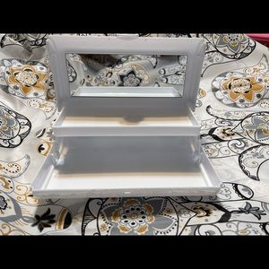 On the go compact cosmetics carrier